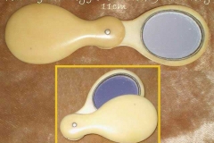 Folding ivory dental mirror